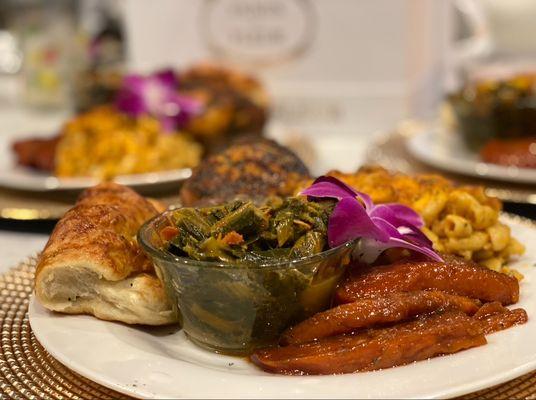 Jerk Chicken w/Mac & cheese, yams & collard greens