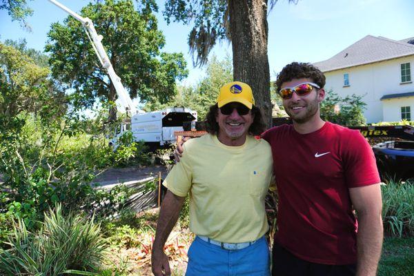 Owner, Paul Rodriguez and one of his two sons working at a job site