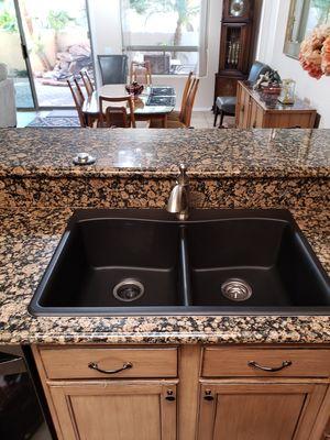 Kohler kitchen sink with Delta faucet installation in Sun City Grand.