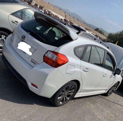 Pearl White Subaru Impreza