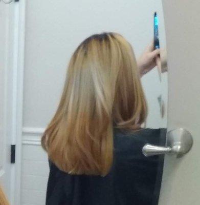 mirror selfie I took after Kristina bleached my hair. Notice that the middle section across is much lighter than the rest