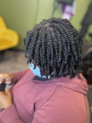 Natural two strand twists. Can be done on wet or dried hair, but most prefer on wet hair for longevity of the style.