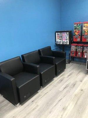 LAUNDROMAT SEATING AREA.