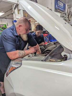 Jerry doing some training with our summer intern Maddy.