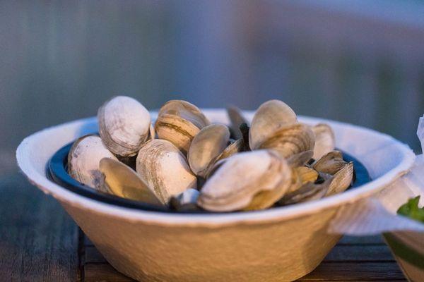 Steamers and the sunset from The Lure Raw Bar's beachfront deck?  Yes please!