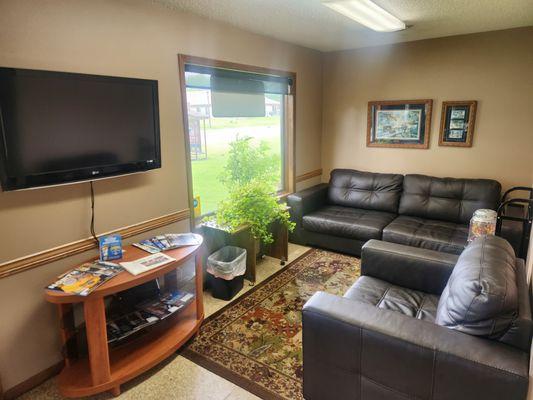 Here's another picture of our waiting area, with it's new couches!