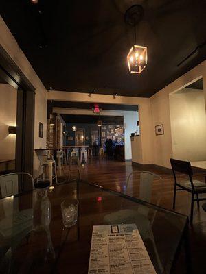 Dining area with bar in sight