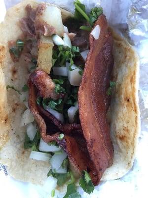 Bean+potato+Bacon w/cilantro and onions on corn tortilla