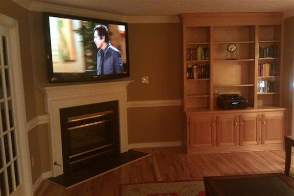 65" Panasonic plasma TV wall mounted. Denon AVR-591 controls the 5.1 Boston Acoustic in-ceiling speakers and the Velodyne subwoo