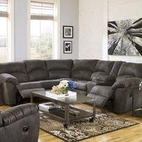 We stock several reclining sectionals. Many with power recline and power headrests.