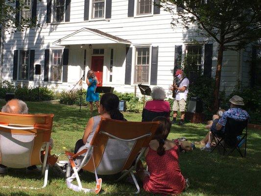 Concert on the farmhouse lawn