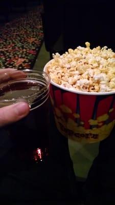 A large beer and popcorn for cheaper than a popcorn at a normal theater !!! Yes please.