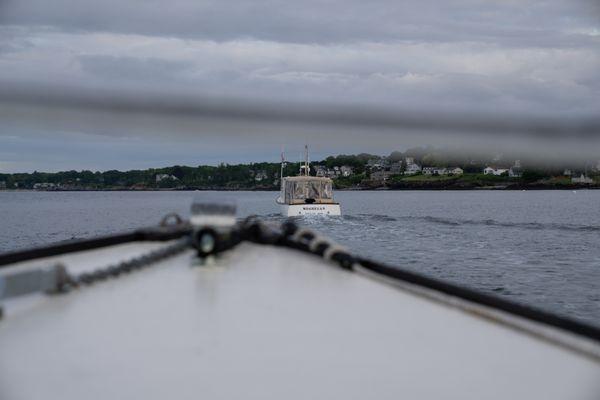 View off the front of our boat charter, following our other vessel into the harbor.