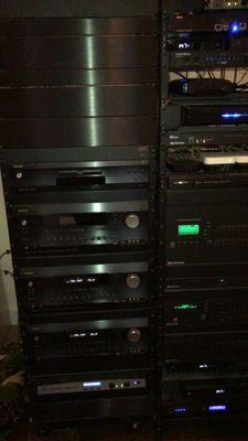 full racked residential system feeding three entertainment rooms, multizone throughout the house and networking.