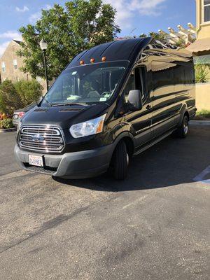 14 Passenger high top Ford transit van