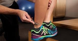 Omega Clinician's treating an Achilles injury.