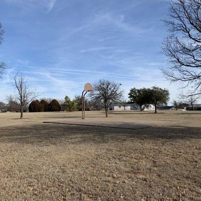 Single basketball goal in Westover Hills Park.