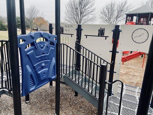 View of the reverse side of the smaller playground (police station theme)