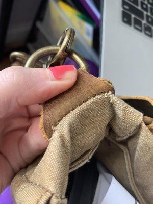 Where the stitching attached back to the bag