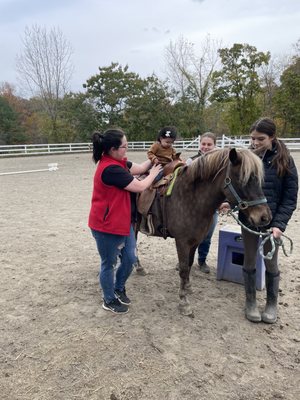 Pony rides, such great girls helping out