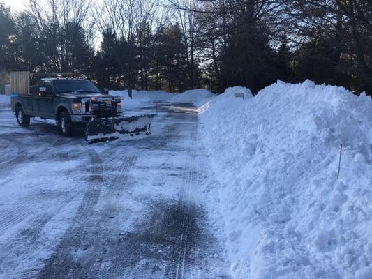 Snow removal for this years blizzard at a local business getting them ready to open on time.