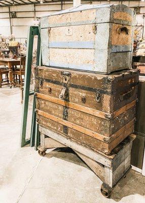 Antique trunks in a vendor booth