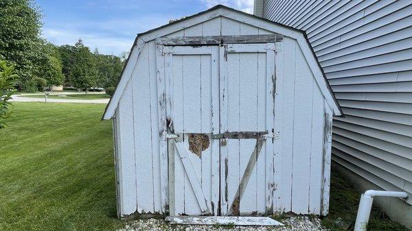 Shed in worn down, rotted shape before Will's reviving facelift.