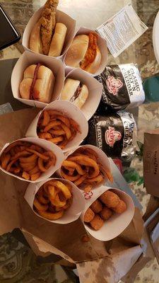 $12 Family Pack 2 Classic Beef n' Cheddar  4 Classic Sliders 4 Small Curly Fries 1 Mozzarella Stick