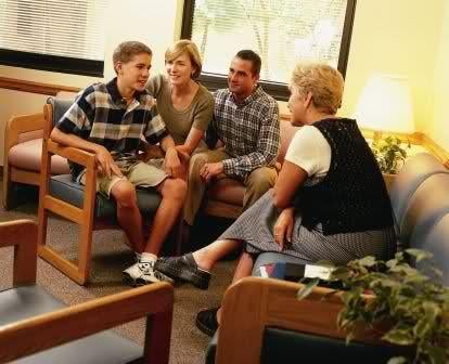 adolescent with parents with counselor