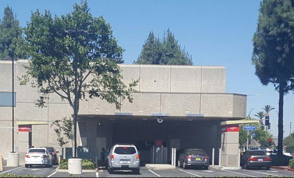 The four drive-thru atms at the rear of the bank.