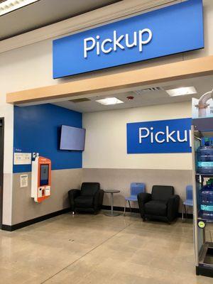 In store pickup area immediately right of the Grocery entrance