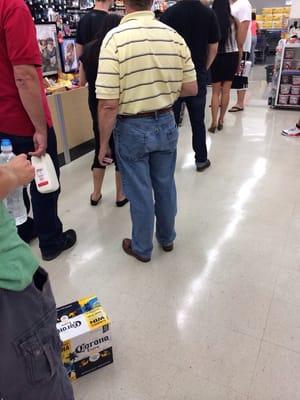 Shocker- the line goes all the way to the back wall by the food section. Two cashiers are open.