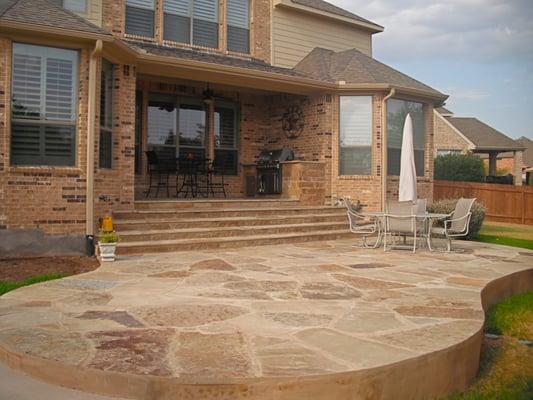 Staircase, flagstone patio, outdoor kitchen