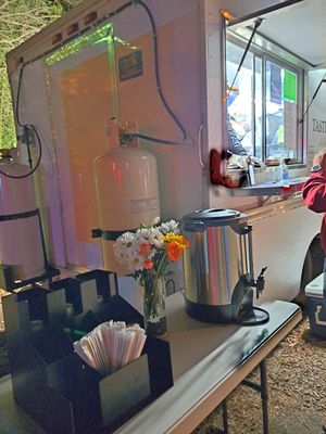 Hot tea table with fresh flowers