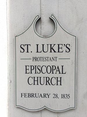 St.Luke's sign hung outside our church doors.