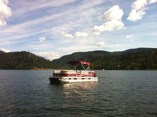 Taking our pontoon for a spin at Wolf Lodge Bay.