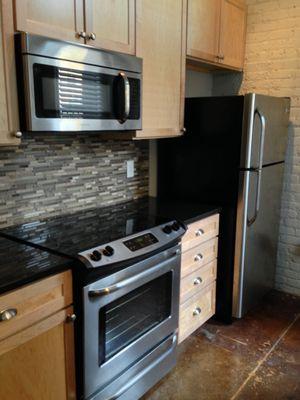 Stainless steel appliances & granite counter tops