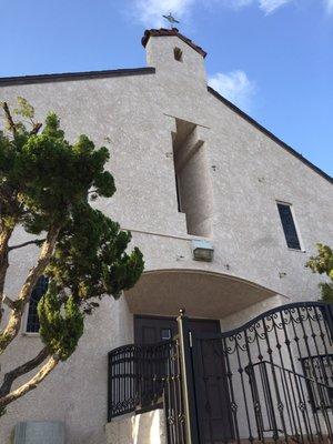 Front of Church.  Don't be confused with the main sign. This is Precious Blood Catholic Church. See marked sign lower left of entrance.