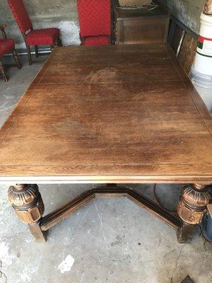 Dining room table before Chip restored it.