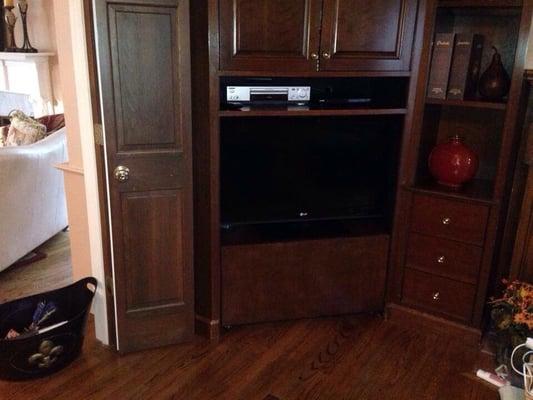 Stained the same tv stand to match the entertainment center.