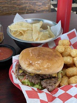 Double cheeseburger, tots, appetizer of chips & salsa.