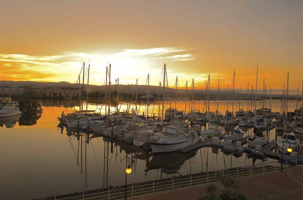 View of an early morning sunrise over the Alameda-Oakland Estuary from our 3rd floor Dining Room.