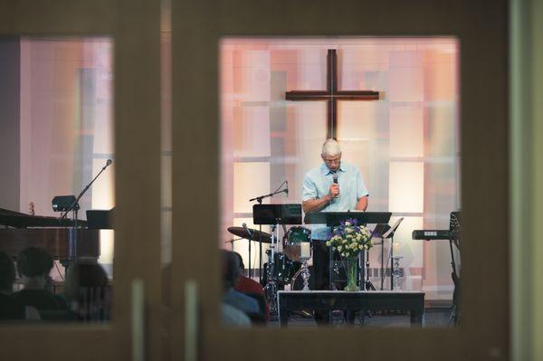 Pastor Tom giving morning announcements