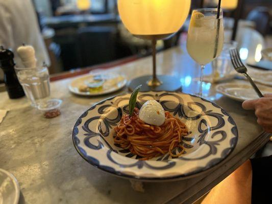 Spaghetti Pomodoro with freshly made Mozzarella cheese + Limoncello Spritz cocktail