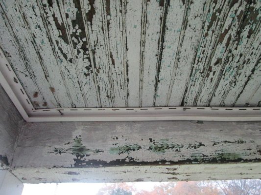 Lead-based paint on a porch ceiling.