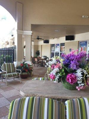 covered patio outside pool area