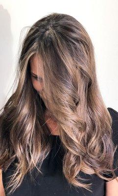 Caramel highlights to brighten up this brunette.