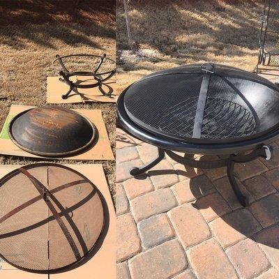 High heat spray painting of old rusty fire pit