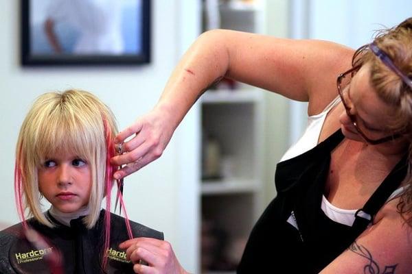 Cutting in Hot pink Hair extensions..