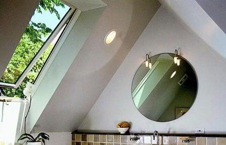 Adding a dormer with skylight enlarged an existing bathroom